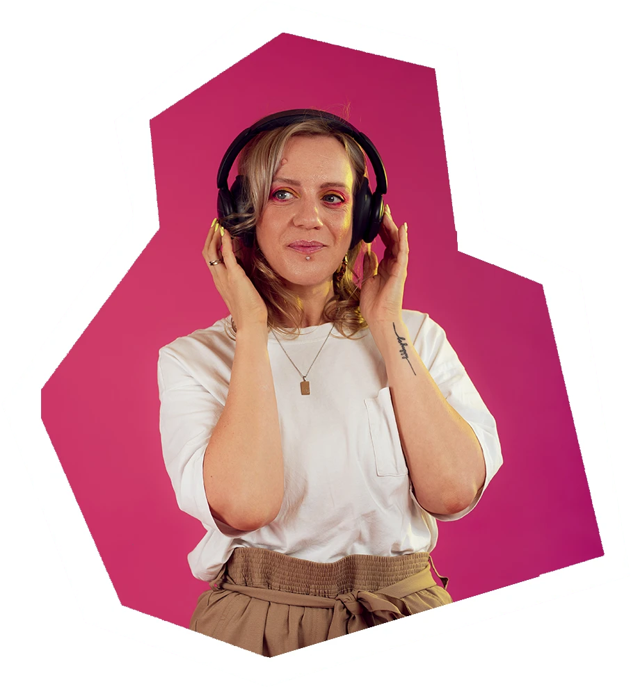 a woman wears headphones