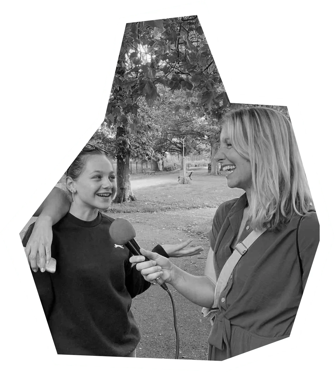 a woman interviews a young girl